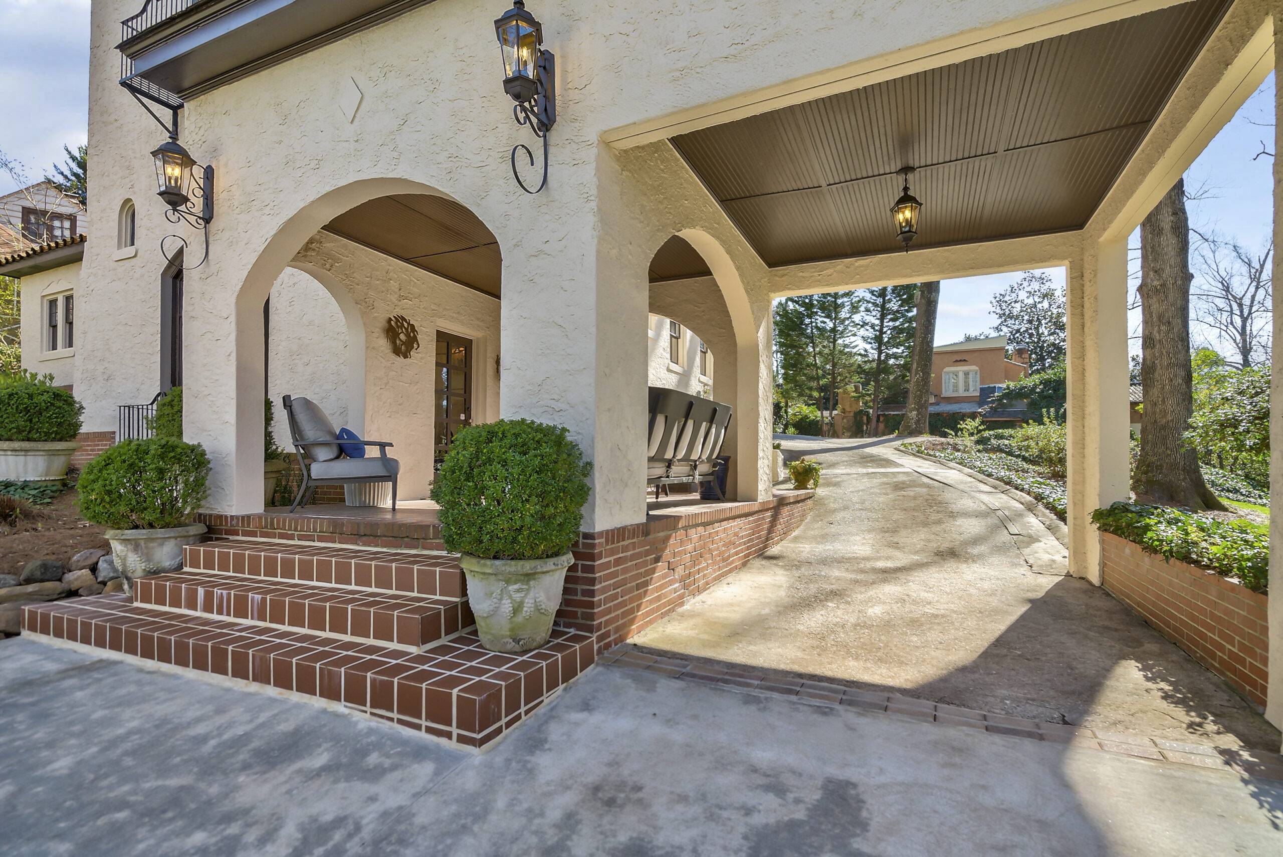 Exterior Painting and Residential Painting Services in North Atlanta Grand entrance with archways and light stucco exterior, showing residential exterior painting in North Atlanta.