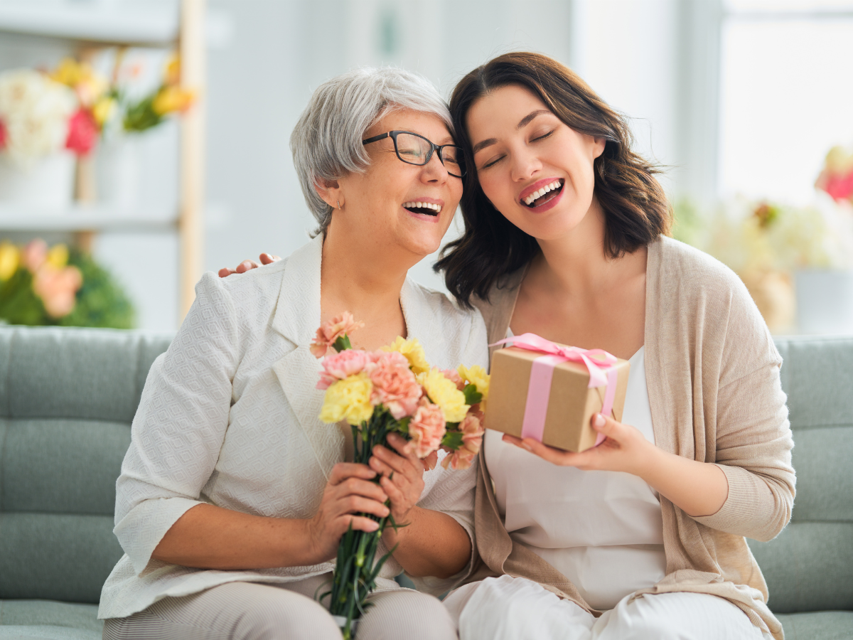 Mother’s Day Gift Idea: A Room Makeover - Mother and daughter hugging with a smile on their faces