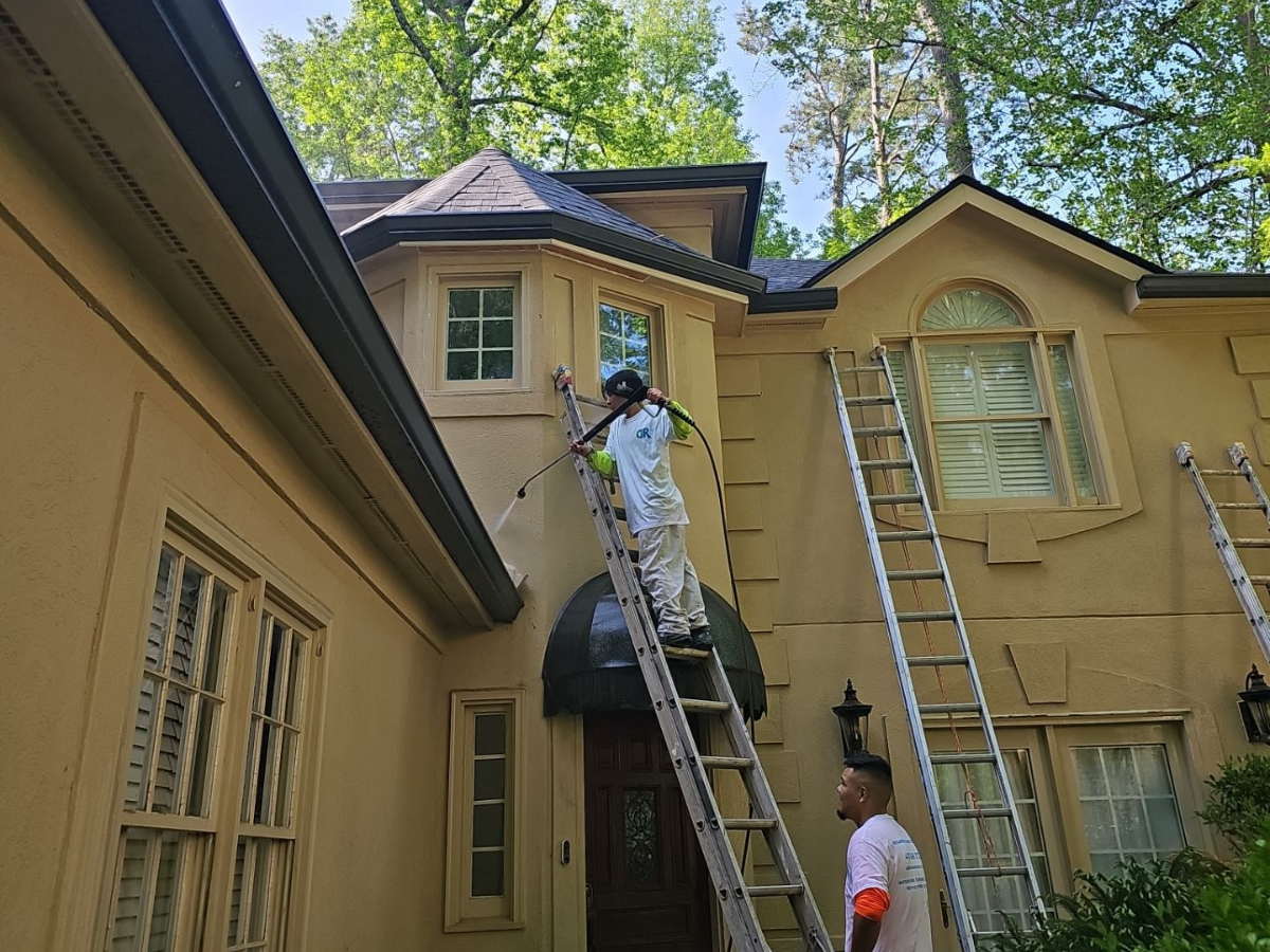 Our Proper Prep Work in Exterior Painting - Painters doing pressure washing