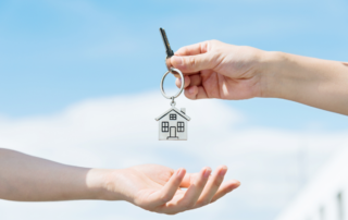 Color Psychology: Best Shades to Help Sell a Home - handing house keys
