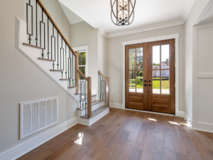 How to Clean Painted Walls Without Damaging Them: Home Maintenance for the Holidays - Entryway of an American house