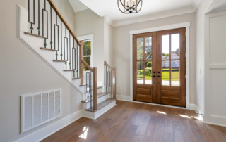 How to Clean Painted Walls Without Damaging Them: Home Maintenance for the Holidays - Entryway of an American house