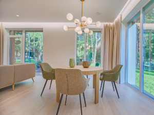 Stop Losing Buyers to Color Chaos: How to Create Flow Across Every Room - Cohesive dining room