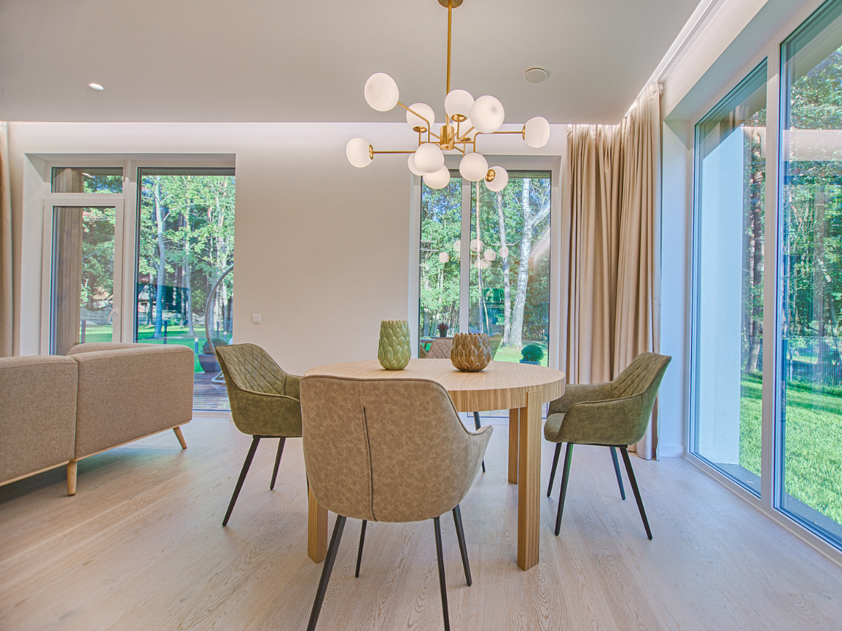 Stop Losing Buyers to Color Chaos: How to Create Flow Across Every Room - Cohesive dining room