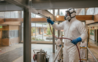 Fire Safety and Paint: Choosing the Right Products for School Buildings - Painting spraying school with fire coatings