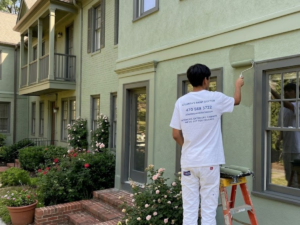 Why Every Atlanta Townhome Community Should Have a 5‑Year Painting Maintenance Plan - Atlanta's Paint Doctor team doing maintenace painting to the exterior of townhomes